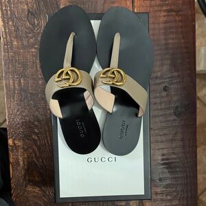 Gucci Black and Beige Sandals with Gold Emblem